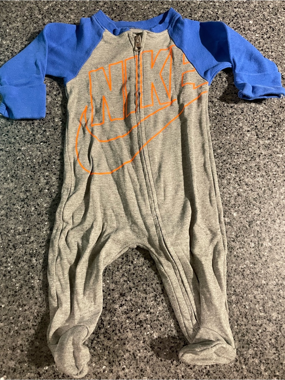Nike Gray Footed One-Piece with Blue Sleeves and Orange Logo